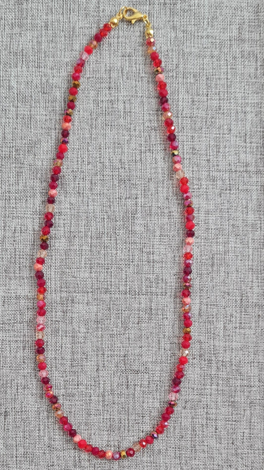 Collier à perles rouges