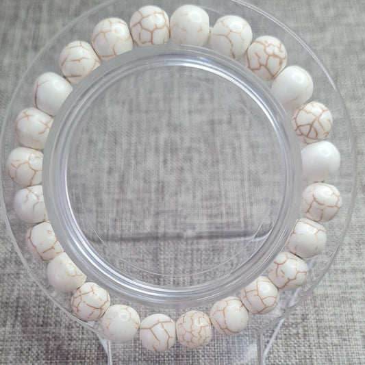 Bracelet en howlite:Élégance pure et sérénité absolue.