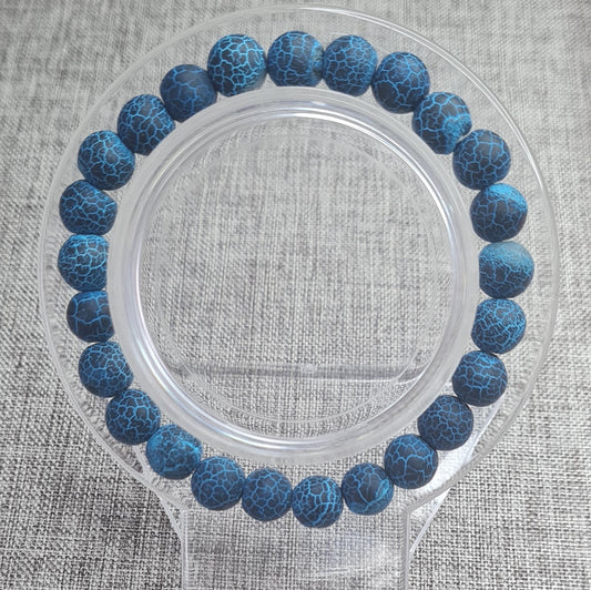 Bracelet en agate bleue craquelée:Élégance et sérénité en une seule pièce.