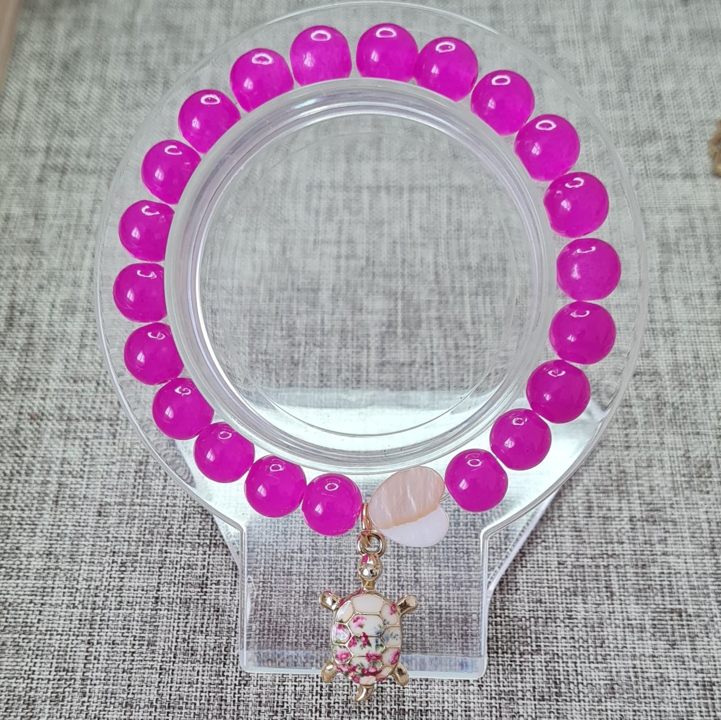 Bracelet rose vifs : protection et amour