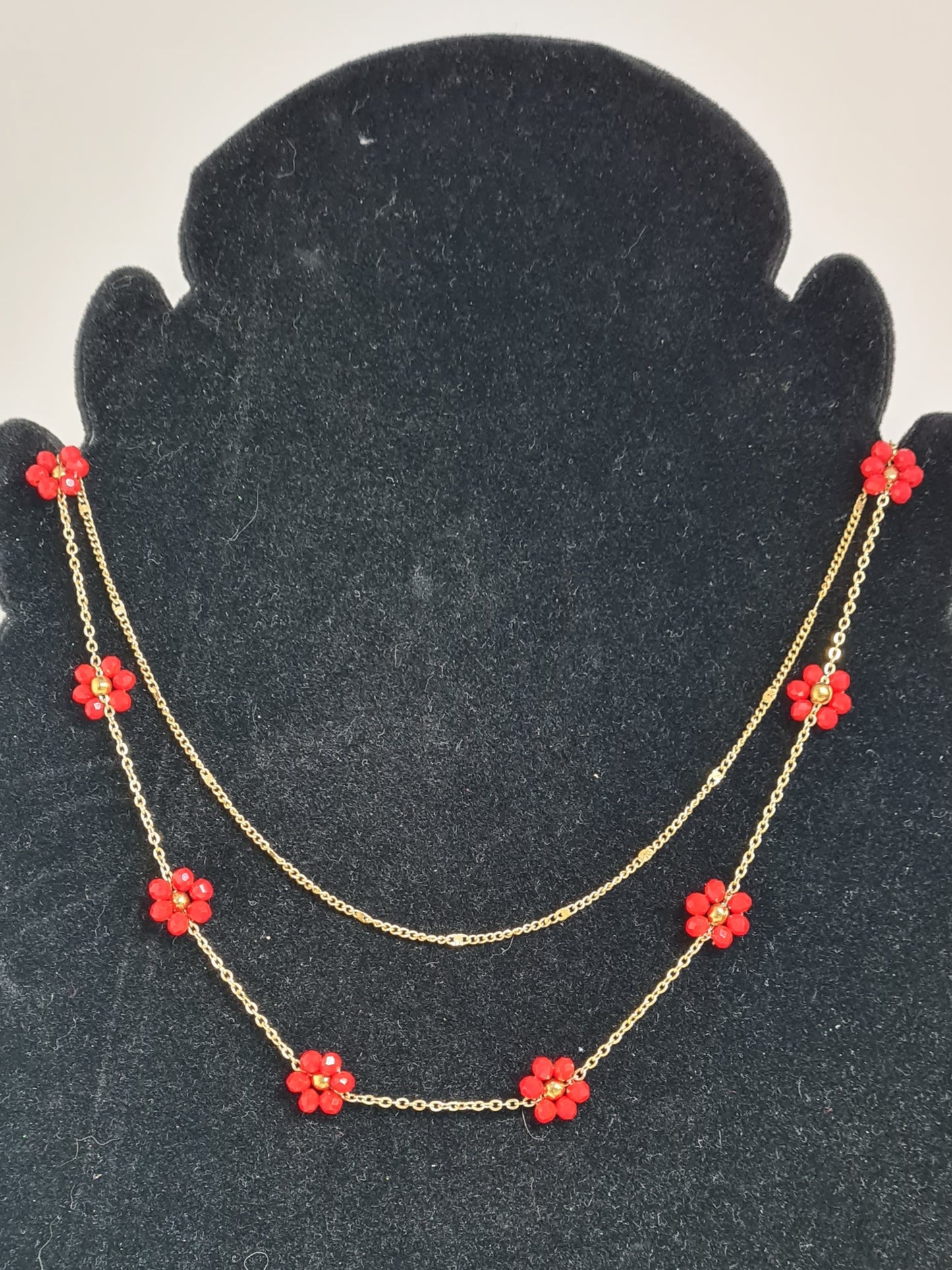 Collier fleurs rouge